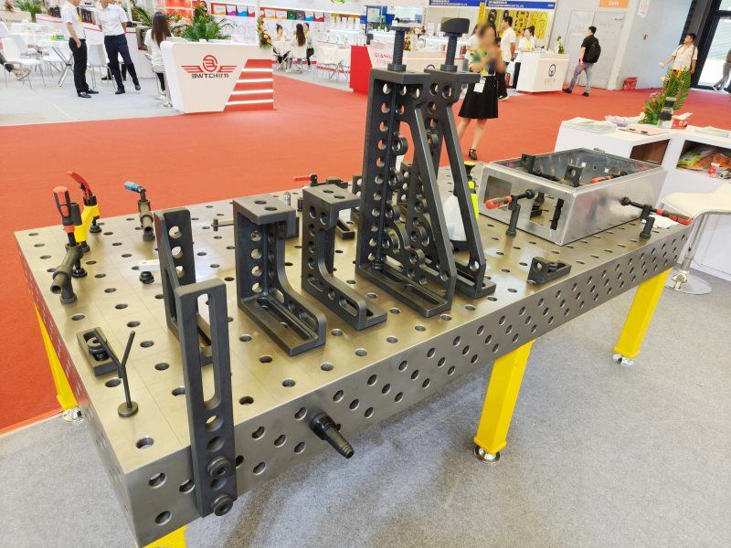 A nitrided 3D welding table features a hardened surface created through a heat-based nitriding process, offering exceptional wear resistance, spatter resistance, and long-term durability. Ideal for heavy-duty metal fabrication, structural welding, and precision assembly, the nitrided surface prevents deformation and resists corrosion without peeling or flaking. This high-performance modular welding table ensures flatness, stability, and consistent accuracy in industrial environments. The nitrided treatment extends the table’s service life, making it a cost-effective solution for professional welders and manufacturers. Choose a nitrided modular welding table to enhance productivity, protect your tools, and maintain precision in every welding project.